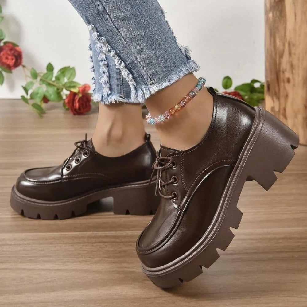 Mocassins à talon en cuir marron pour femme