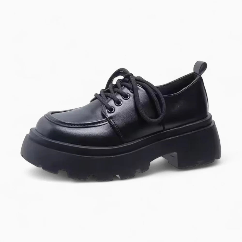Mocassins en cuir noir à talon et plateforme pour femme