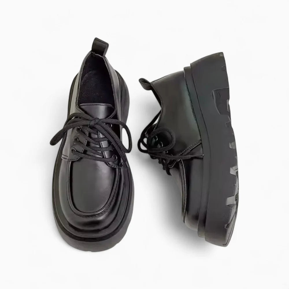 Mocassins en cuir noir à talon et plateforme pour femme